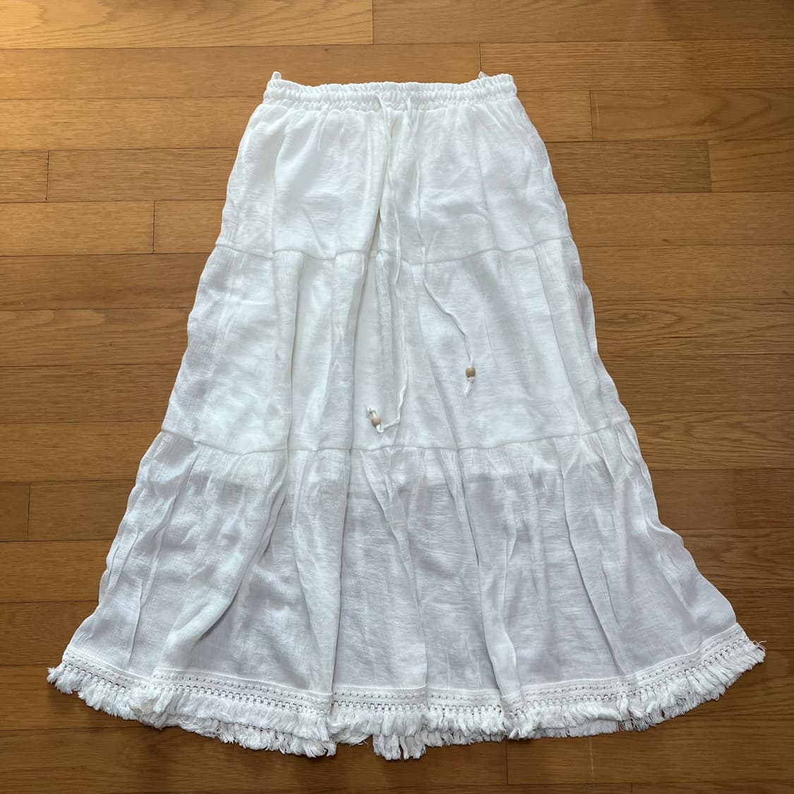 모리 화이트 테슬 롱스커트 상품이미지1