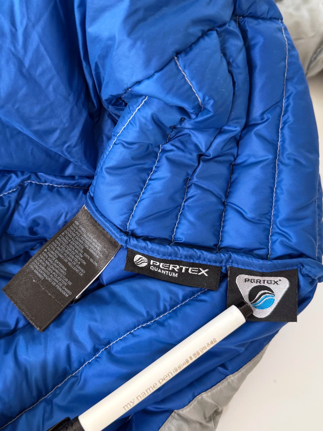 TNF 노스페이스 루즈핏 라이트그레이 구스다운 경량 패딩 자켓 상품이미지6