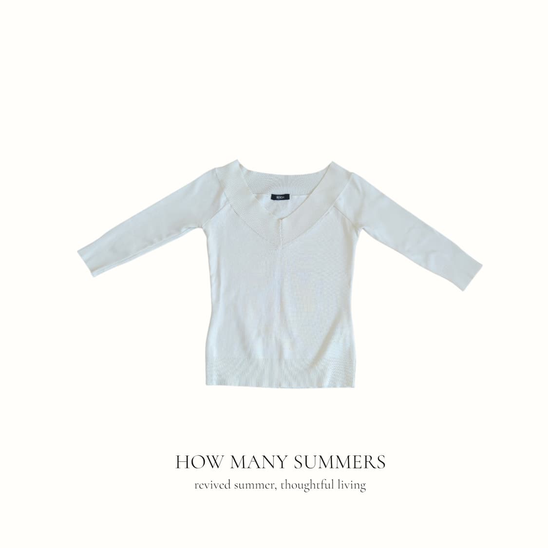 보쉬 페미닌 무드 쇄골 라인 화이트 니트 상품이미지1