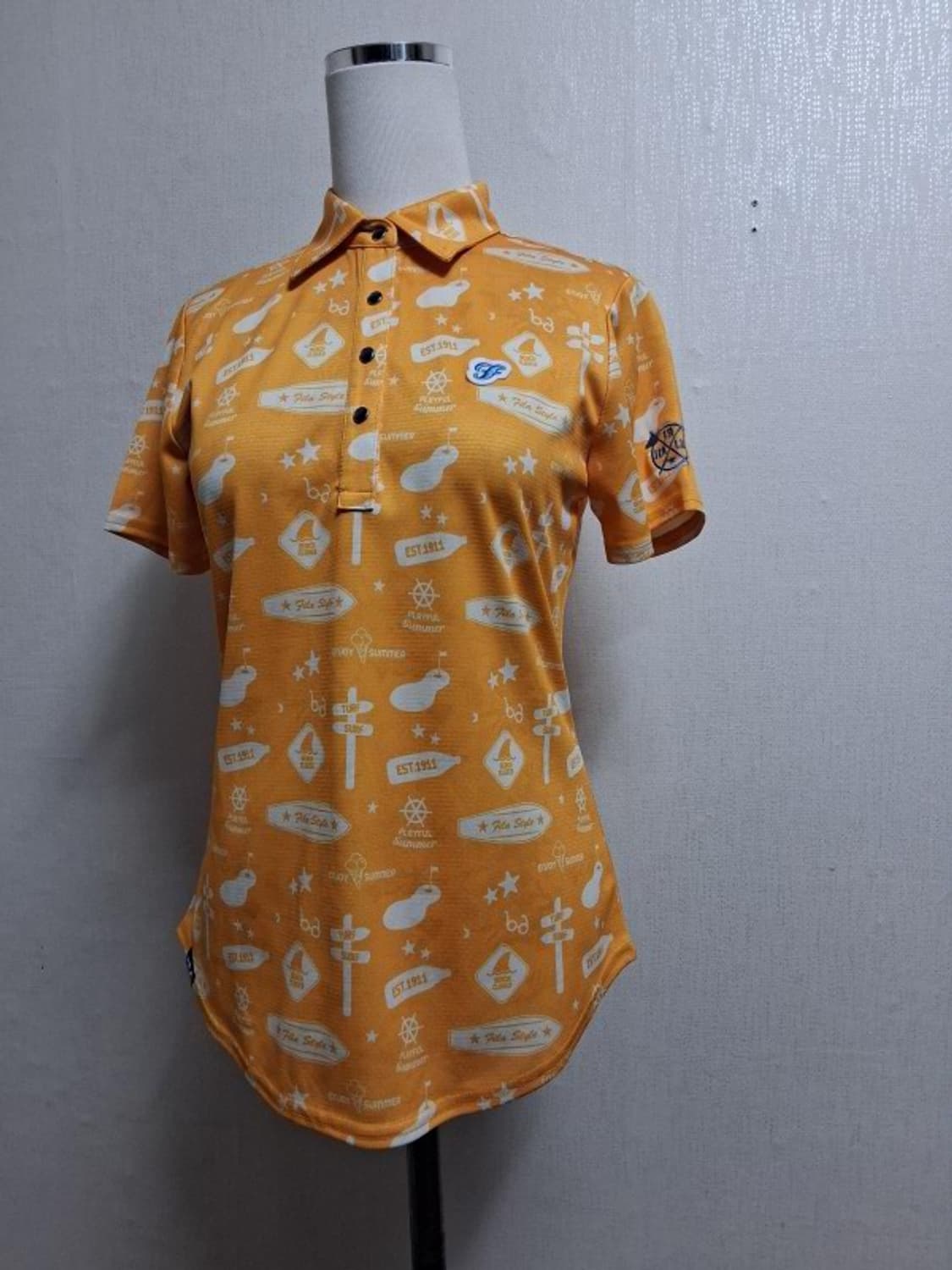 휠라골프 여성반팔티 새옷상태 55 상품이미지1