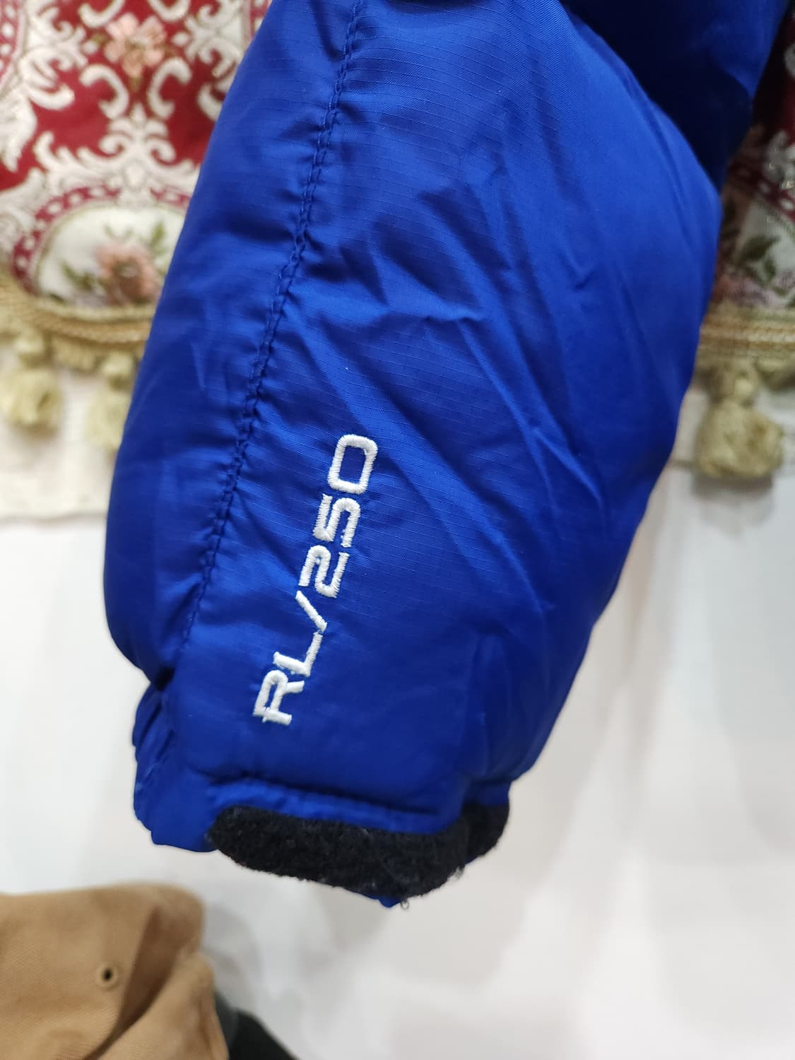 폴로 랄프로렌 블루 오리털 패딩점퍼
​
 상품이미지4