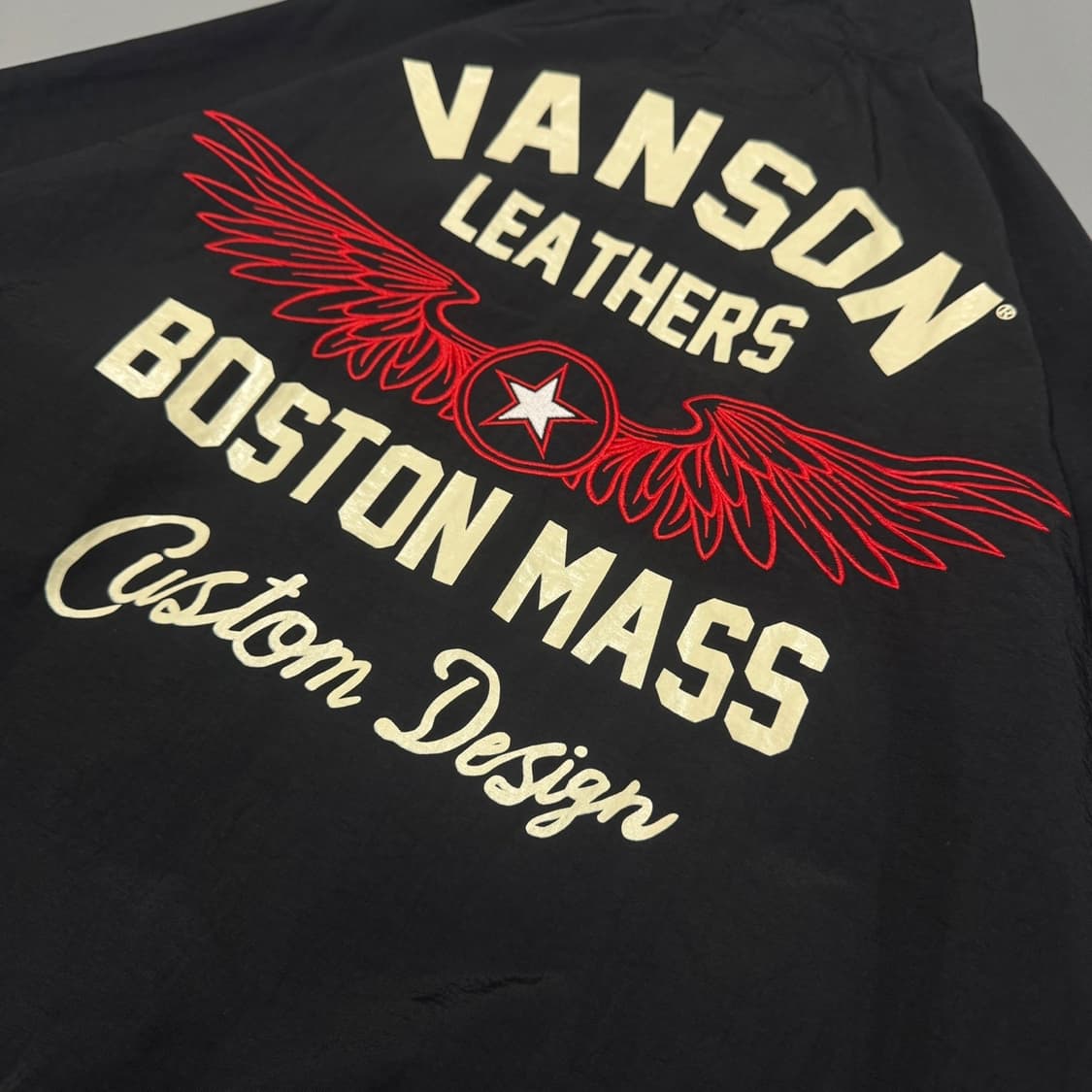 밴슨(VANSON) 블랙 양면 자수 로고 프린팅 플라잉스타 윈드브레이커 상품이미지6