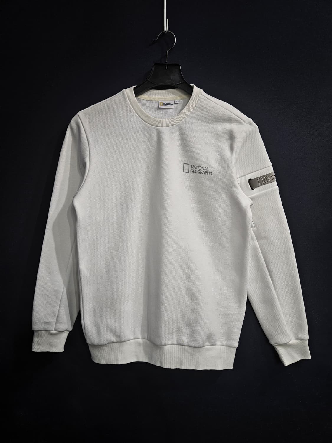 내셔널지오그래픽 화이트 남성 세미오버핏 95 맨투맨  상품이미지1