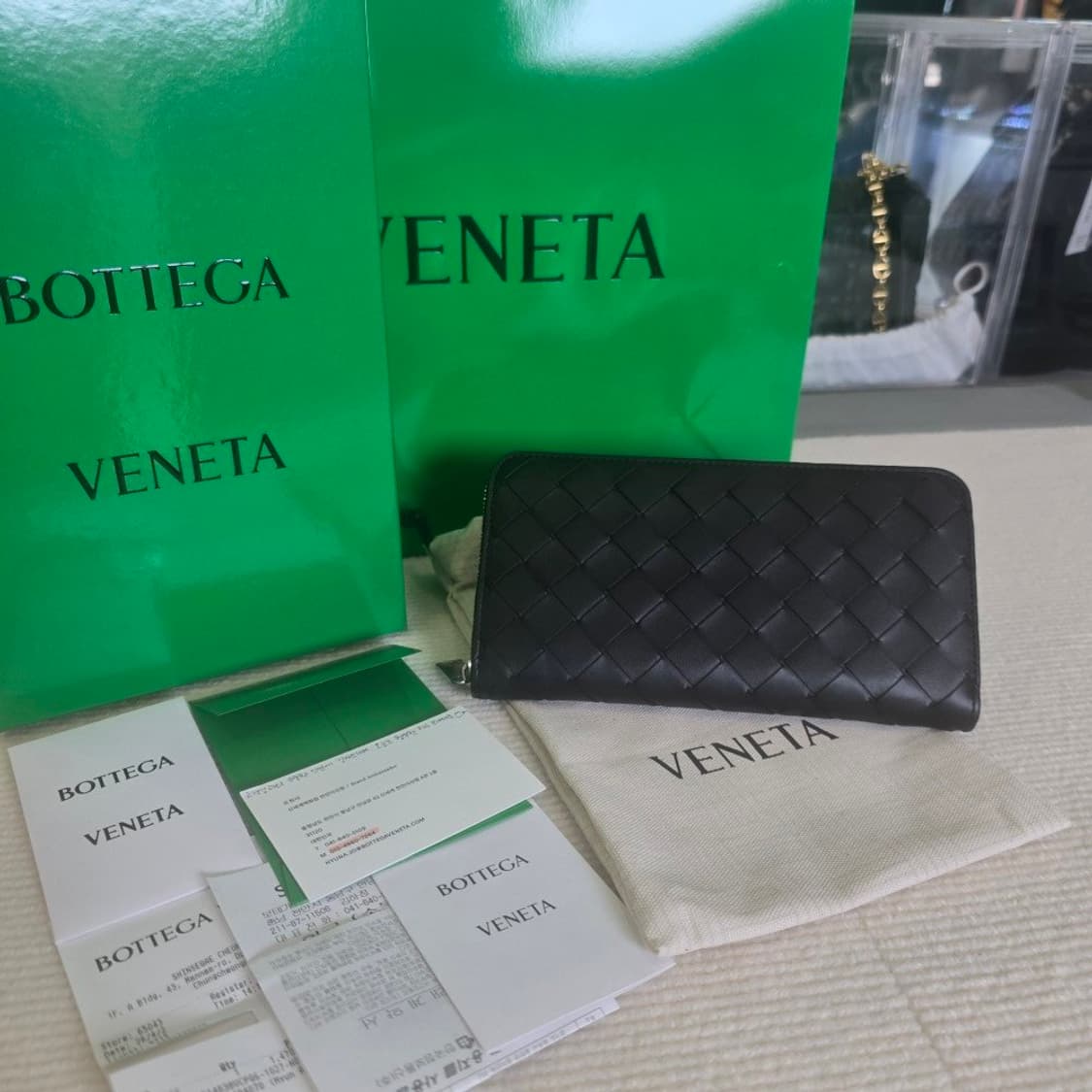 [중고/정품] 보테가 베네타 인트레치아토 지퍼 어라운드 지갑 블랙/그래스 상품이미지1