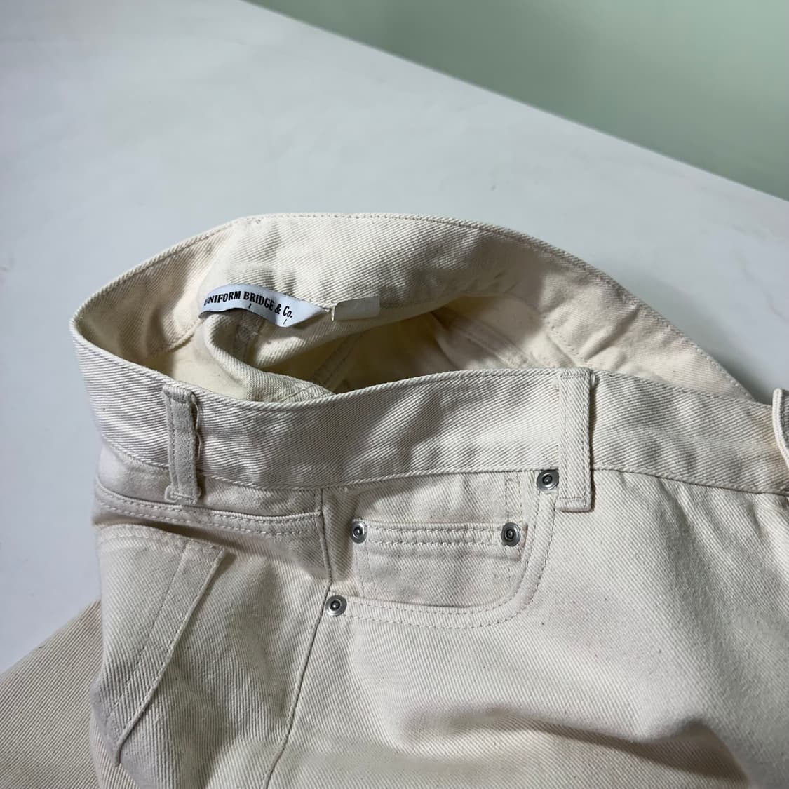 L 유니폼브릿지 레귤러핏 일자핏 크림아이보리 데님팬츠 상품이미지1