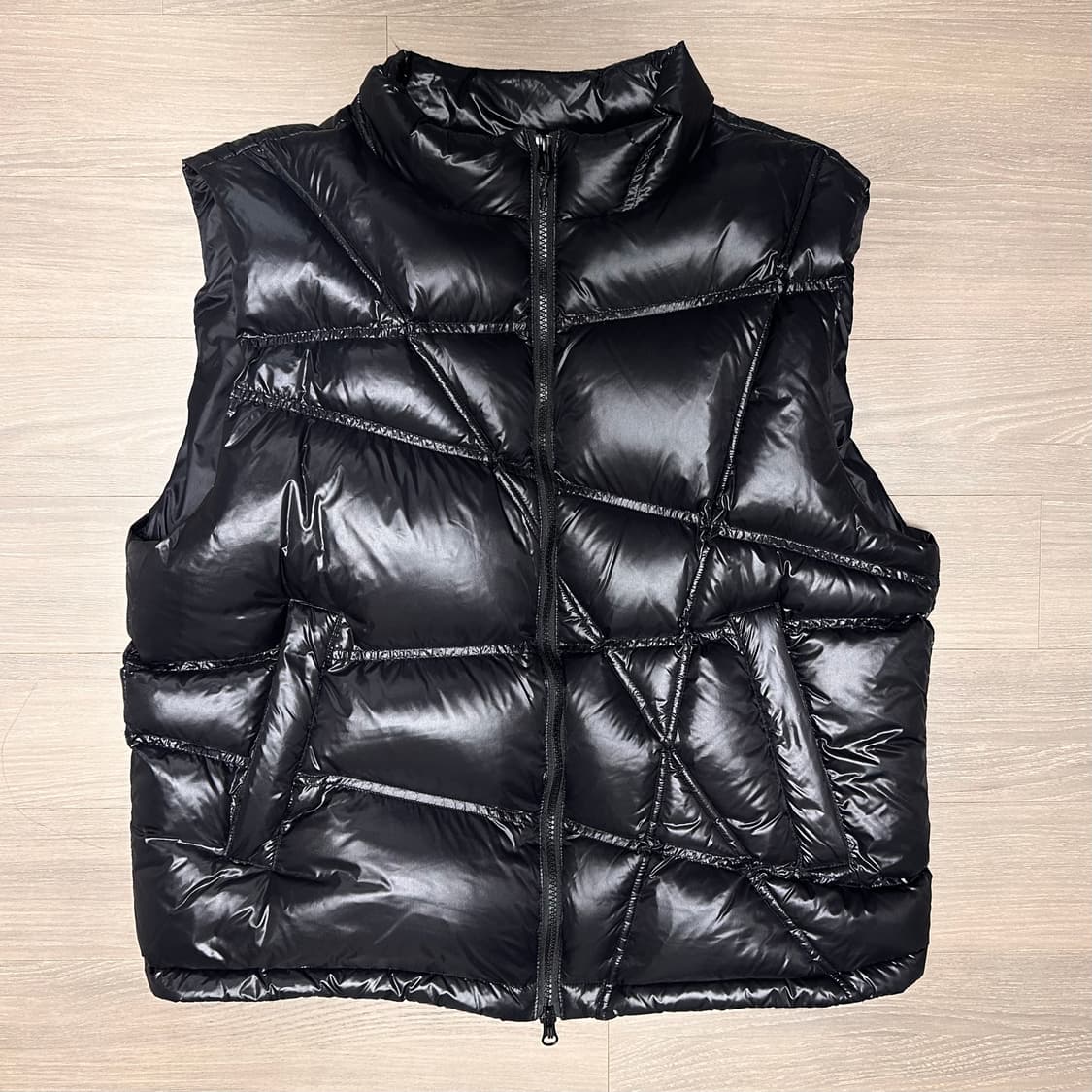 노매뉴얼 트랙 덕 다운 베스트 - 글로시블랙 M 상품이미지1