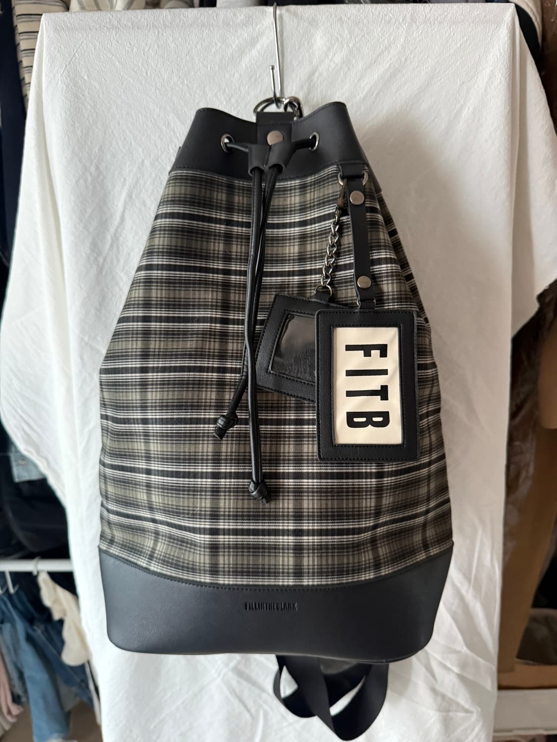 [FILLINTHEBLANK] 필인더블랭크 체크 드로우스트링 백 상품이미지1