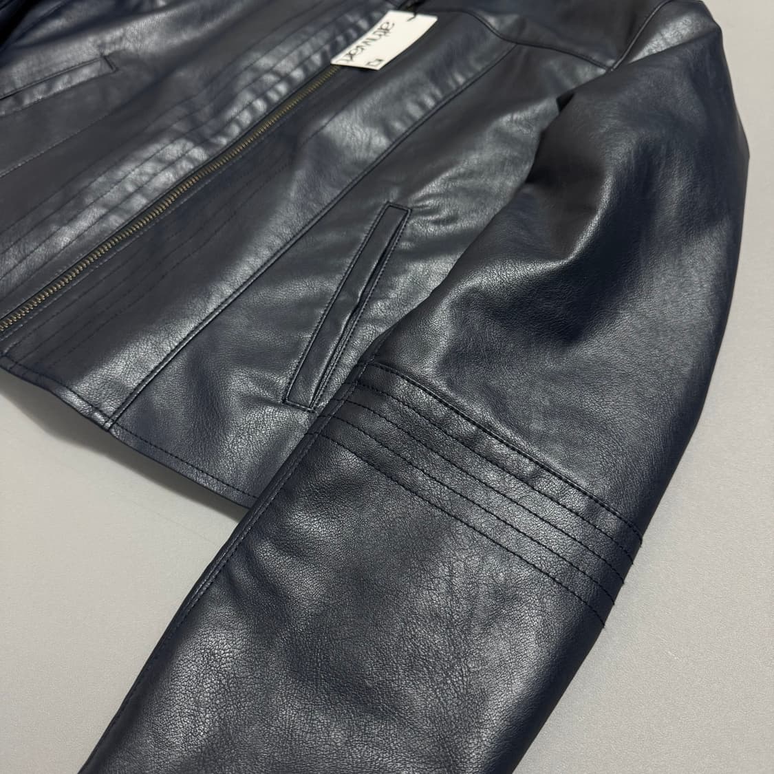 Oriens by 저널스탠다드 다크블루컬러 비건 레더 쇼트 라이더스 자켓 상품이미지5