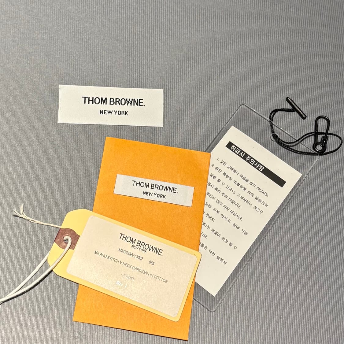 (2)톰브라운 사선완장 밀라노 스티치 시어서커 가디건 상품이미지5