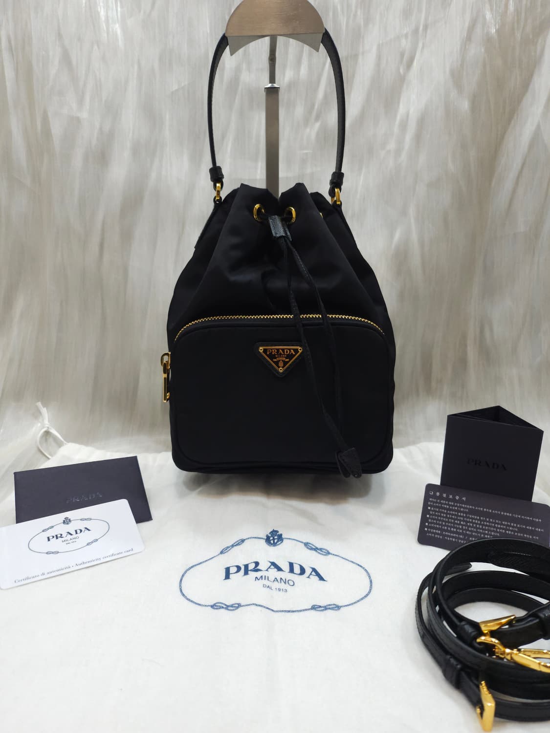 [정품] 프라다 리나일론 버킷백 상품이미지1