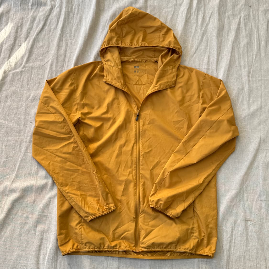 유니클로 머스타드 바람막이 L 상품이미지1