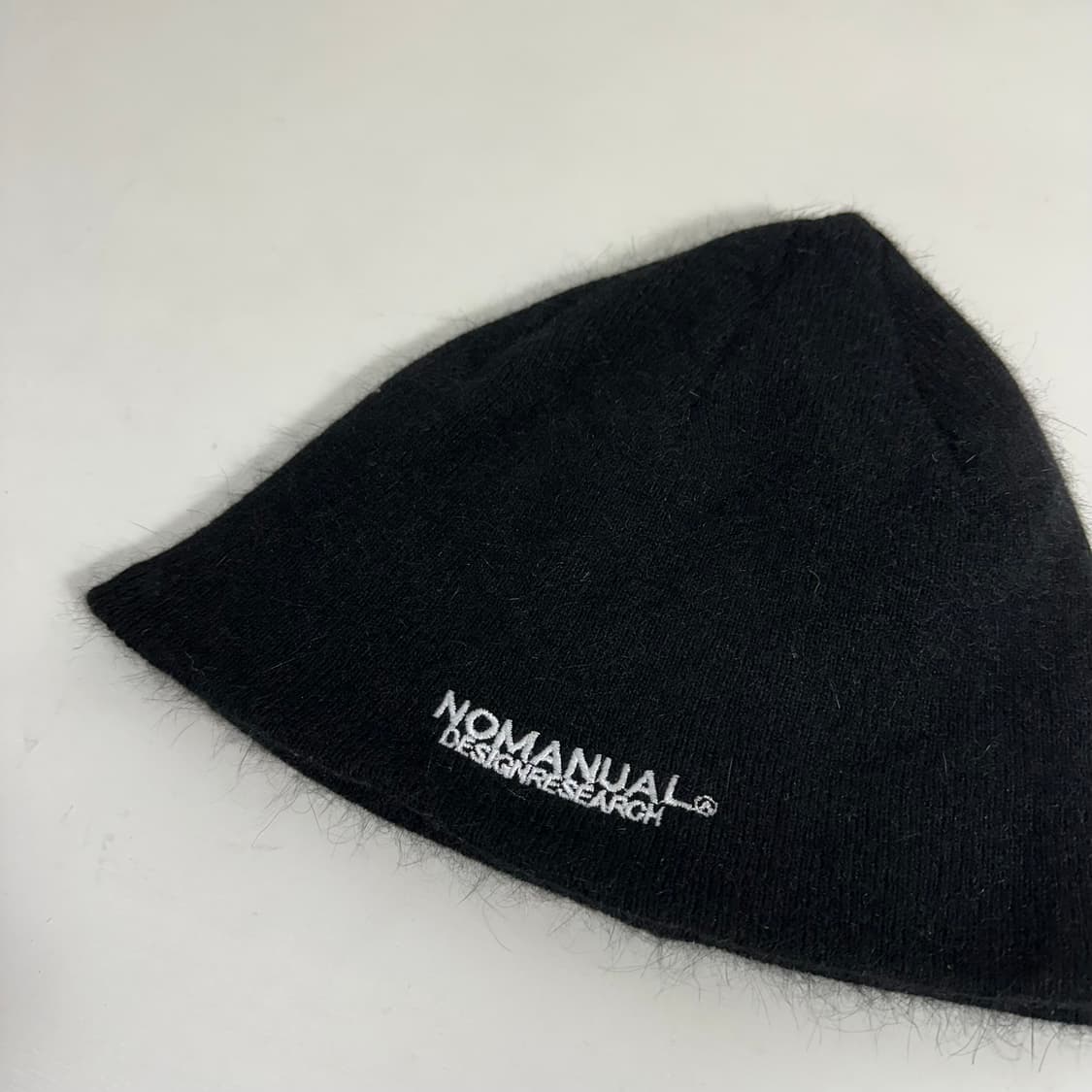 FREE 노매뉴얼 블랙 헤어리 스컬캡 비니 상품이미지1