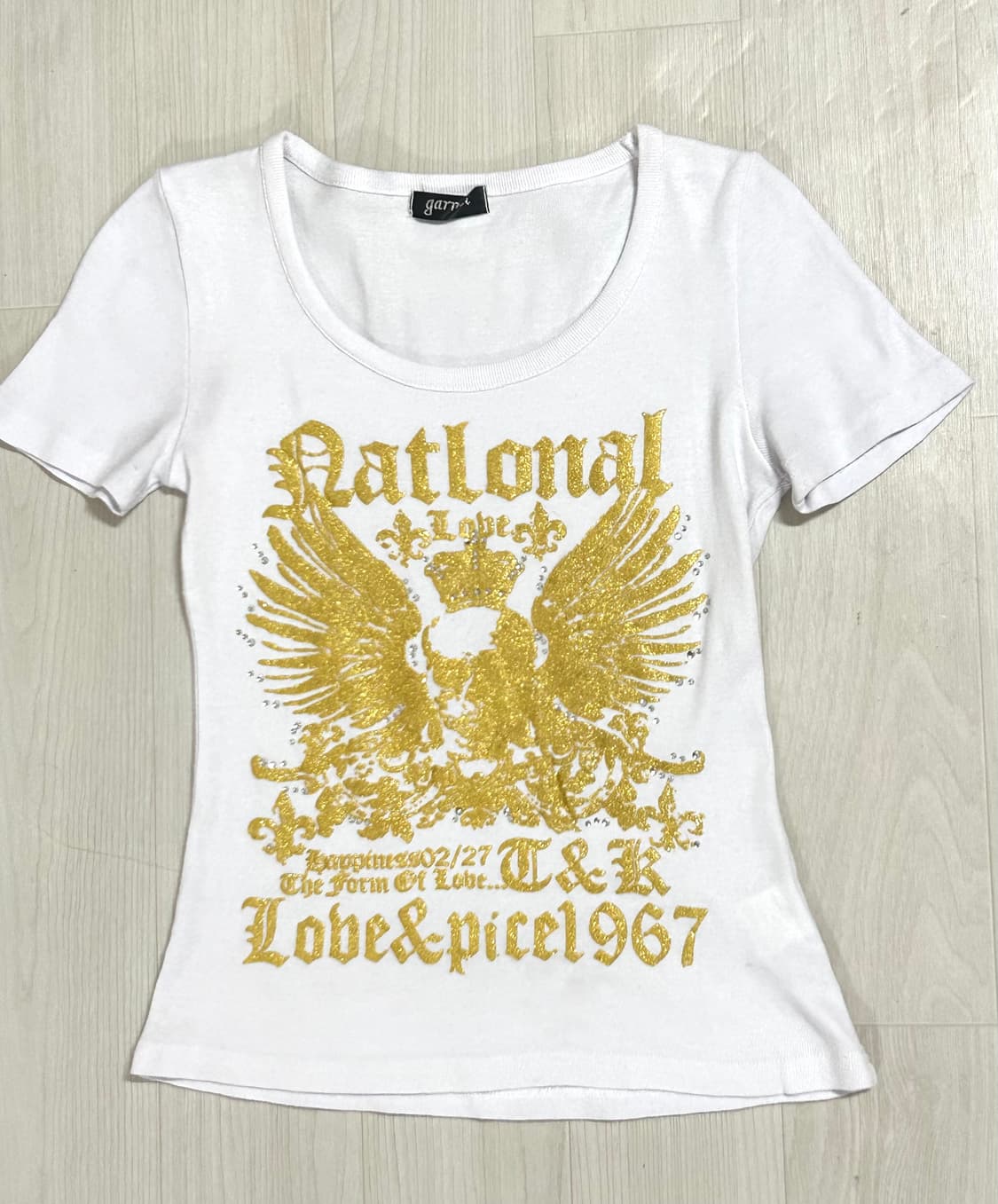 Garnet 골드윙 스컬 프린팅 큐빅 글리터 탑 상품이미지1