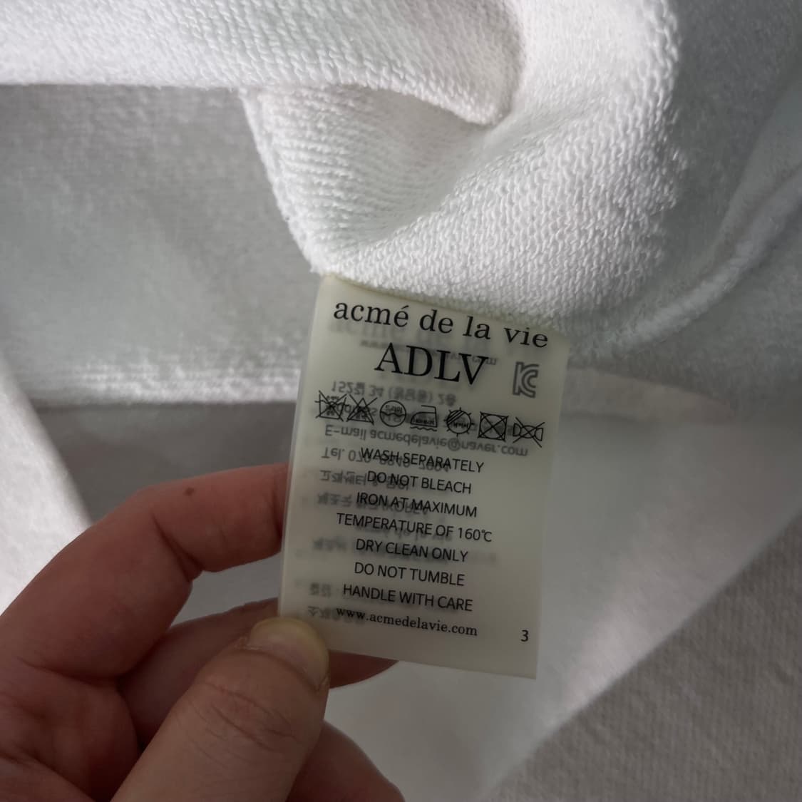 100 아크메드라비 화이트 맨투맨 상품이미지10