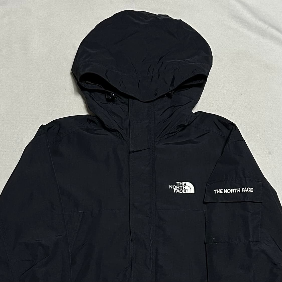 105 노스페이스 암포켓 블랙 후드 바람막이 상품이미지1