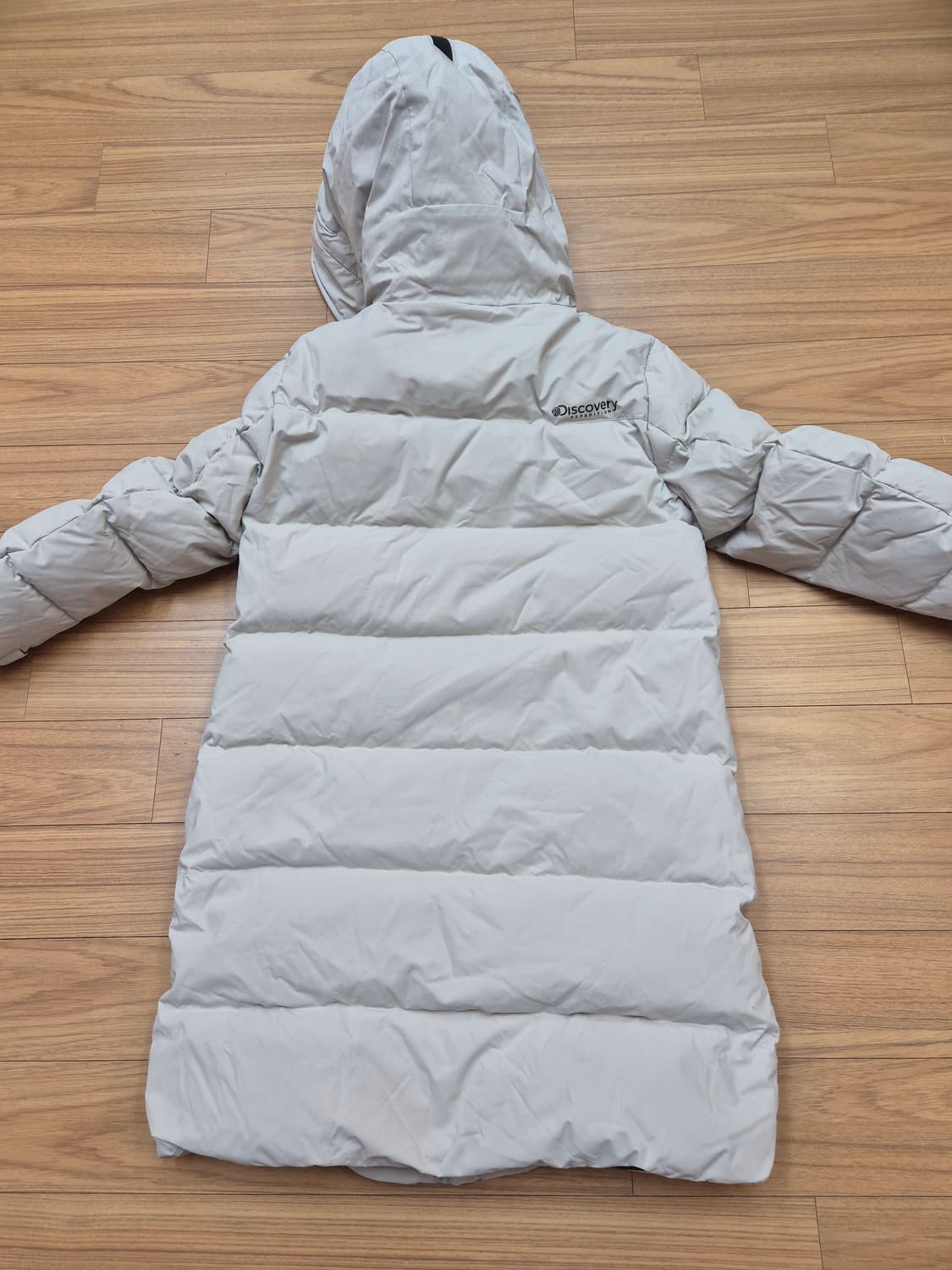 디스커버리 익스페디션 키즈 롱패딩 아이보리 색상입니다. 사이즈는 130입 상품이미지2