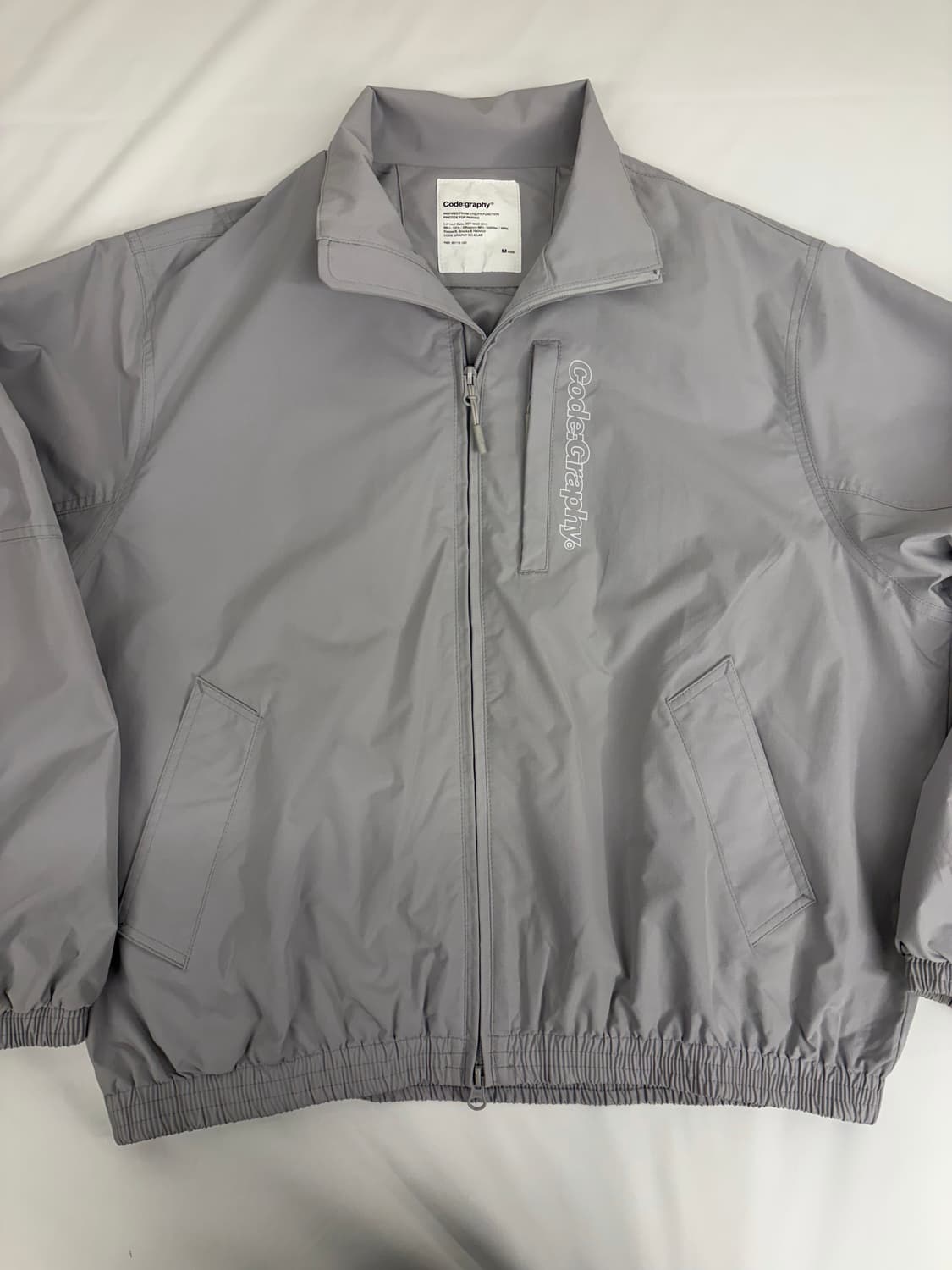 [M] 코드그라피 오버핏 바람막이 자켓 상품이미지1