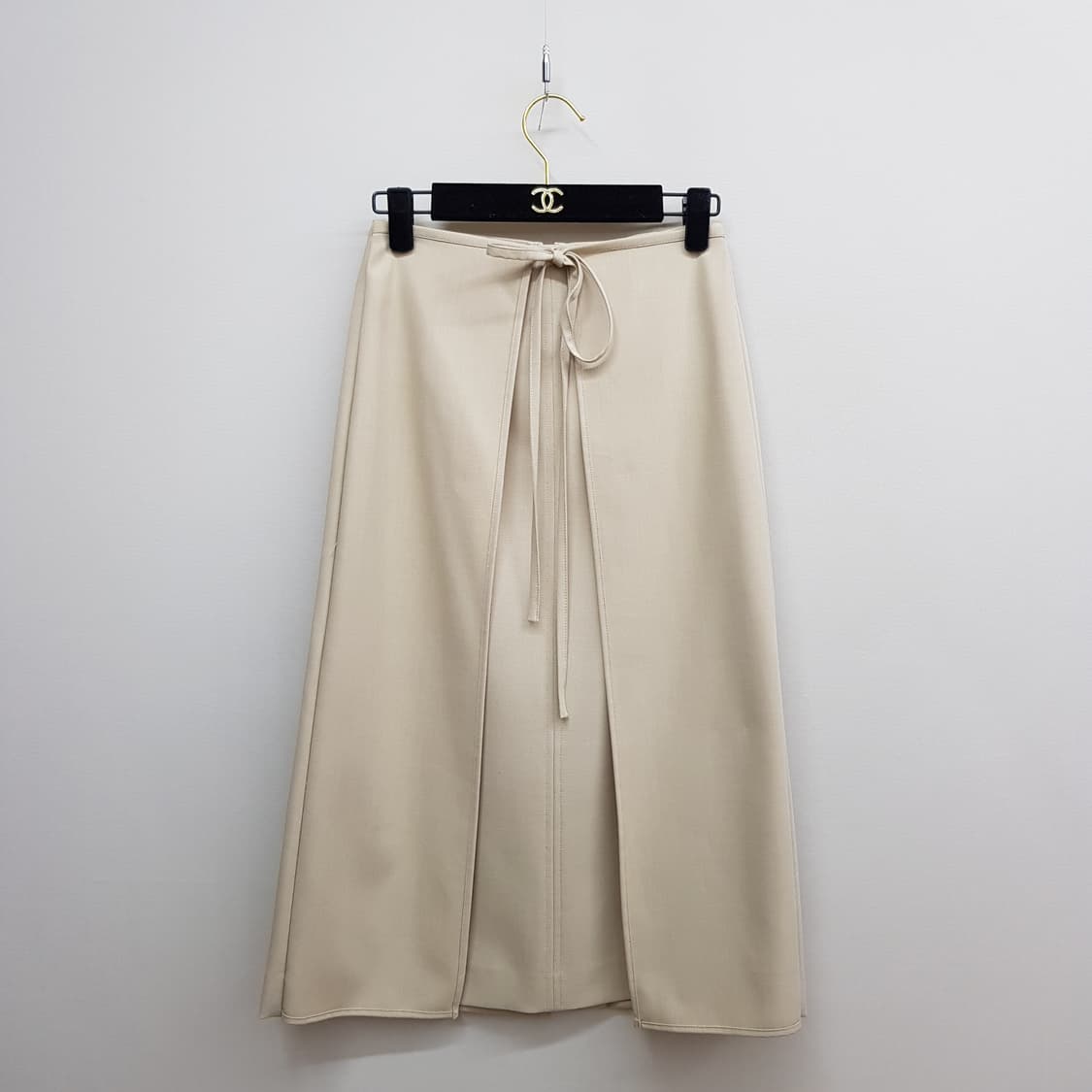 구호플러스 2025 랩 스타일 미디 스커트 1사이즈 상품이미지1