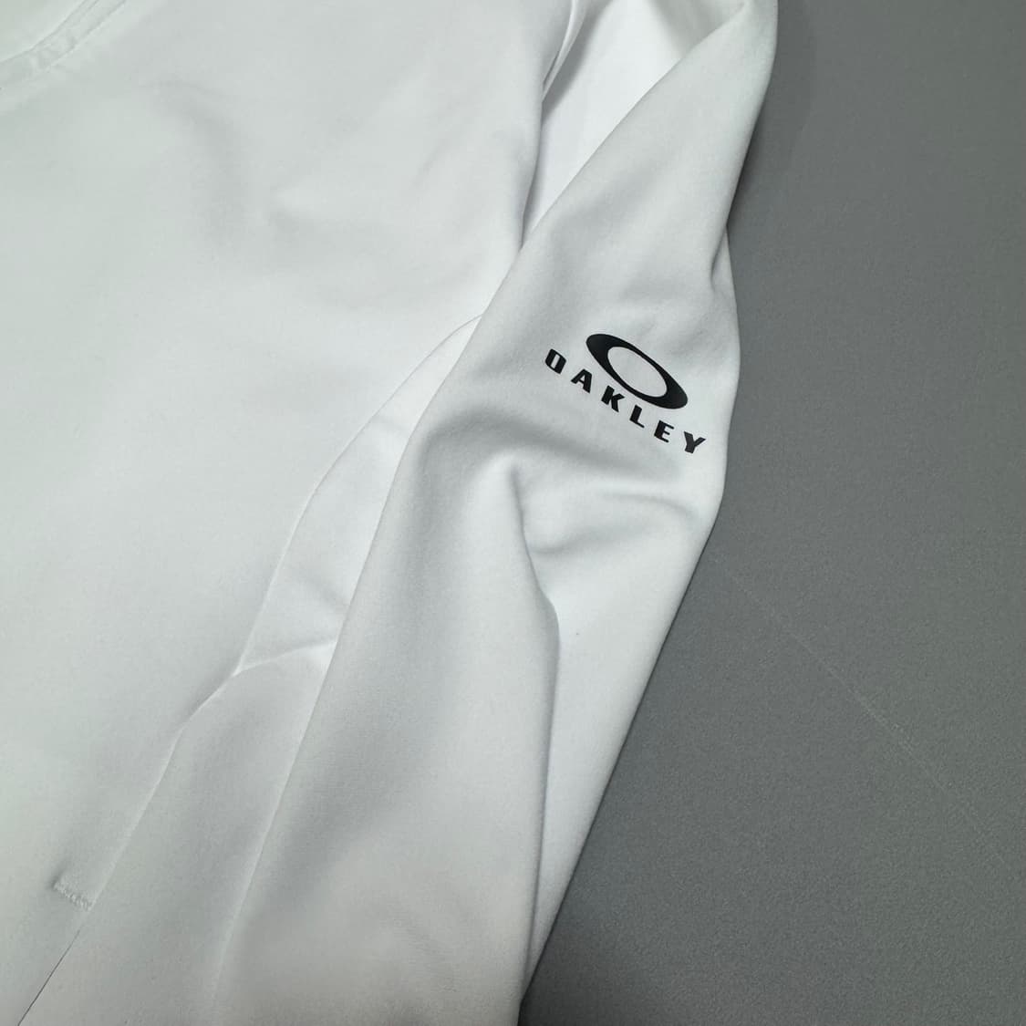 오클리(OAKLEY) 화이트 인핸스 그리드 폴리에스터 후드 윈드브레이커 상품이미지5