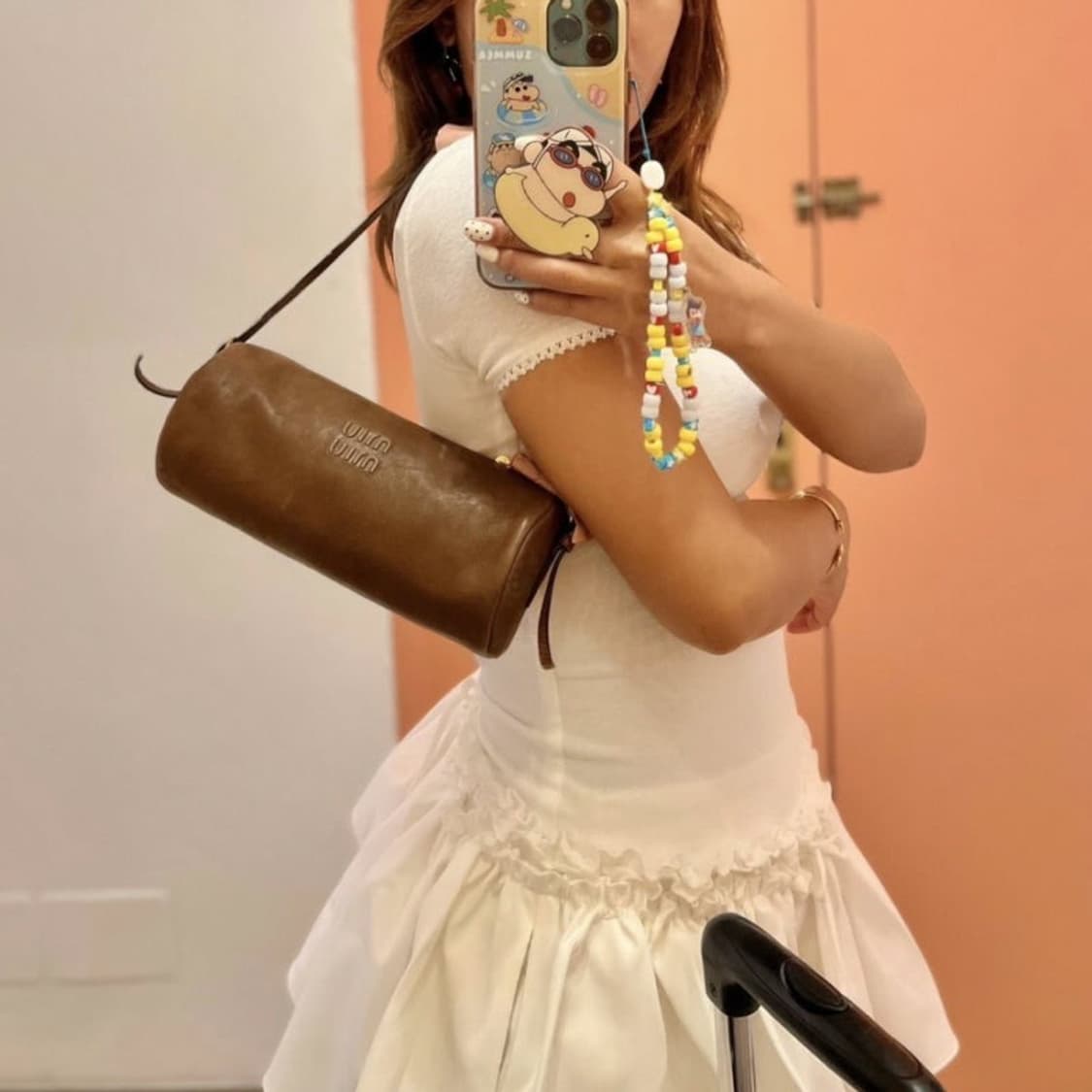 (백참포함) 미우미우(MiuMiu) 나파 레더 파우치 실린더백 거의 새것 상품이미지8