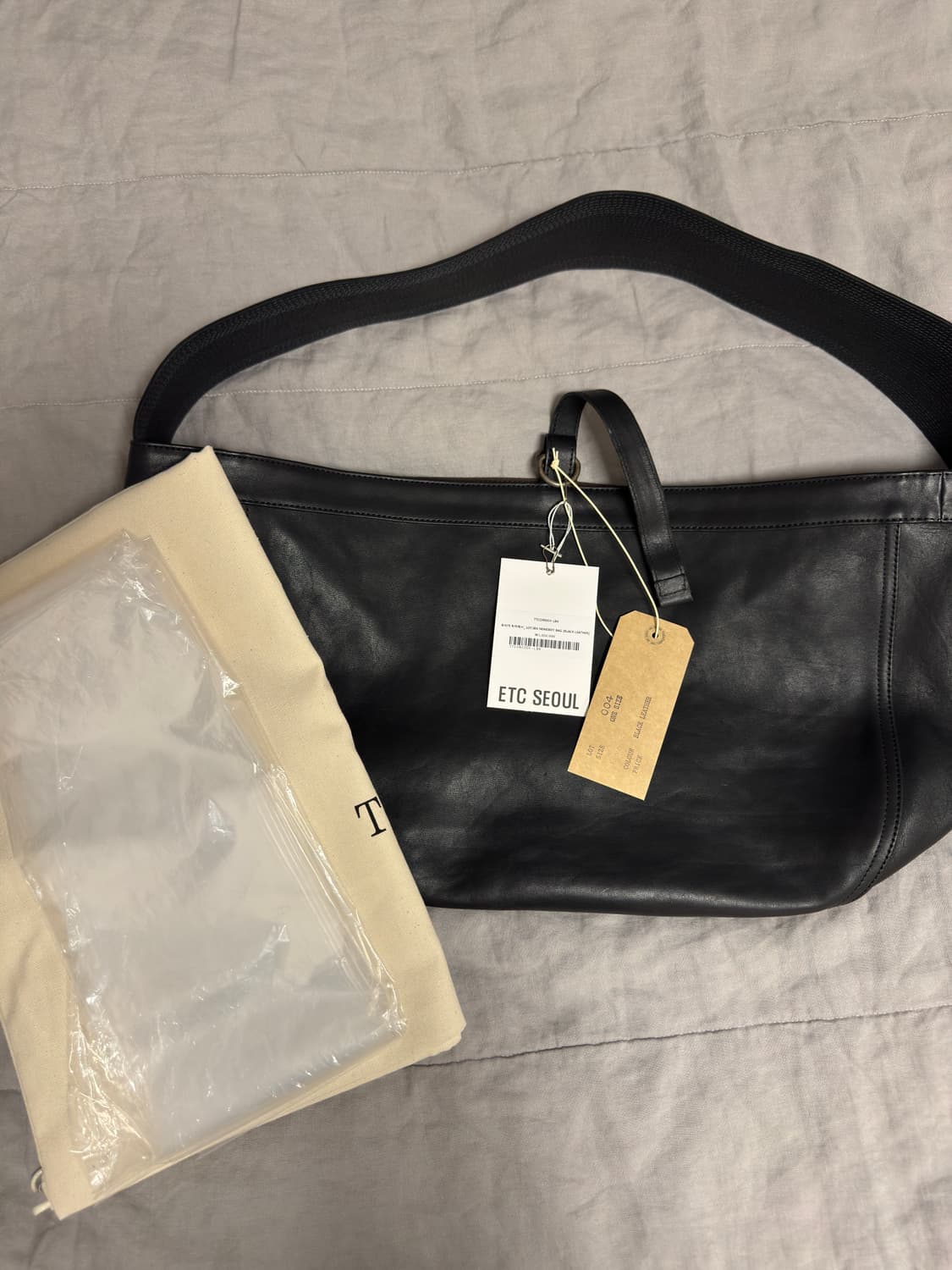 [매장구매] 타이가 타카하시 T.T 뉴스보이백 L 블랙 상품이미지1