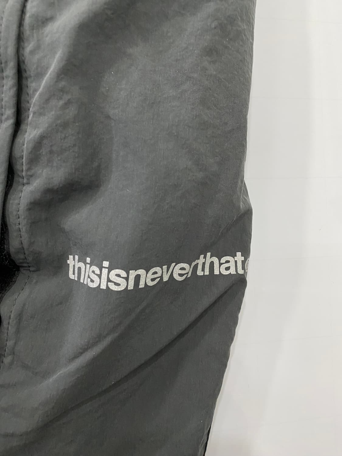 디스이즈네버댓 로고 스카치 나일론 팬츠 상품이미지3