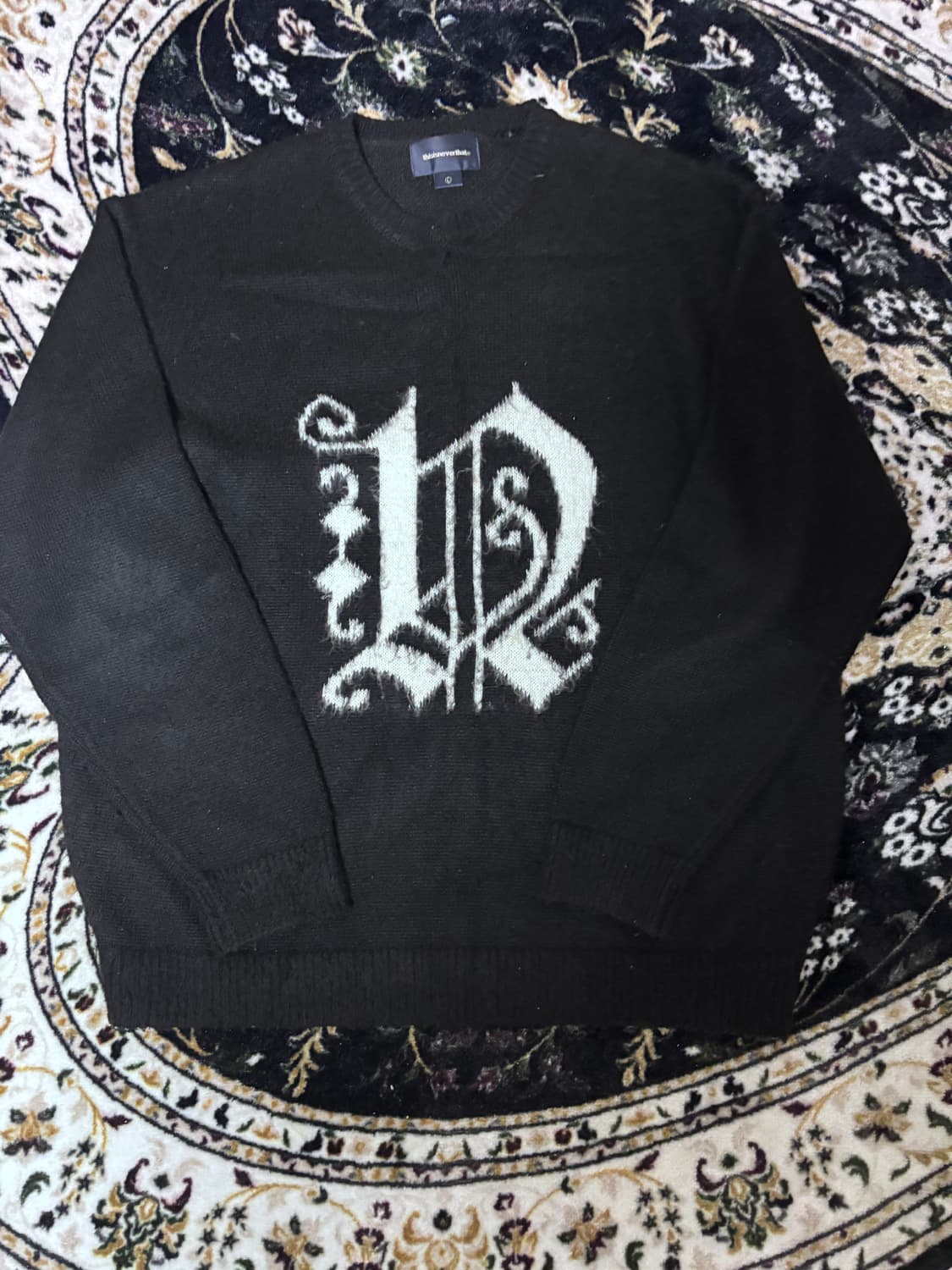 디스이즈네버뎃 니트 상품이미지1