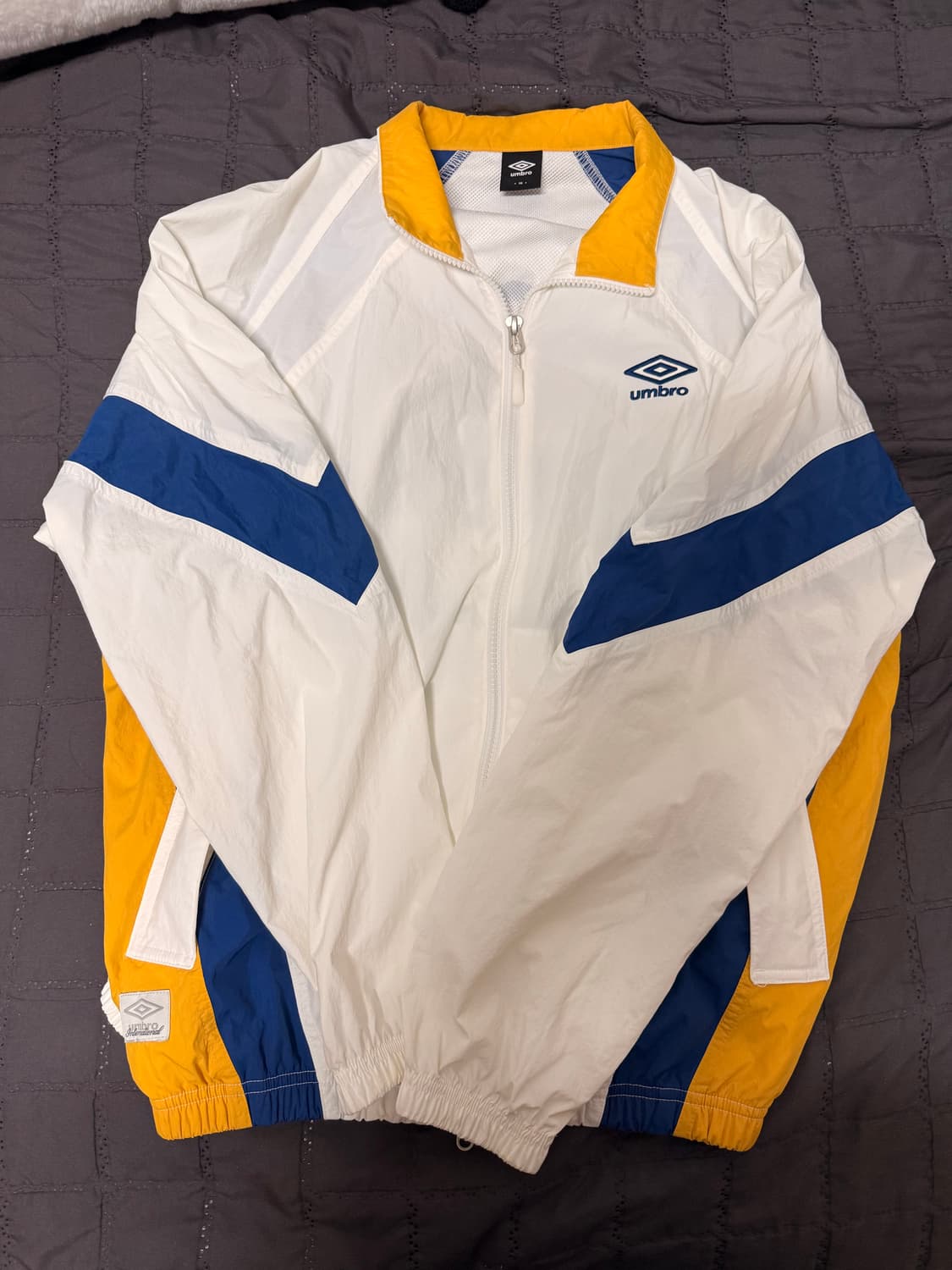 팝러쉬 컬러블럭 스탠넥 바람막이 자켓 / sweetcorn UQ123CJ 상품이미지1