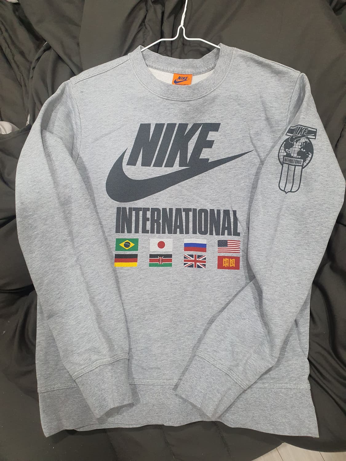 나이키 인터네셔날 맨투맨 상품이미지1