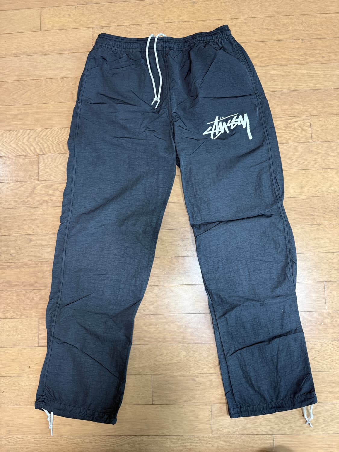 [S] 나이키 x 스투시 나투시 비치 팬츠 오프느와르 상품이미지1