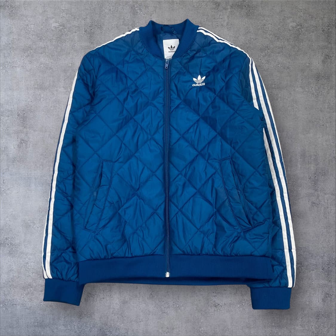 아디다스 블루 컬러 슈퍼스타 퀼팅 경량 패딩 상품이미지1