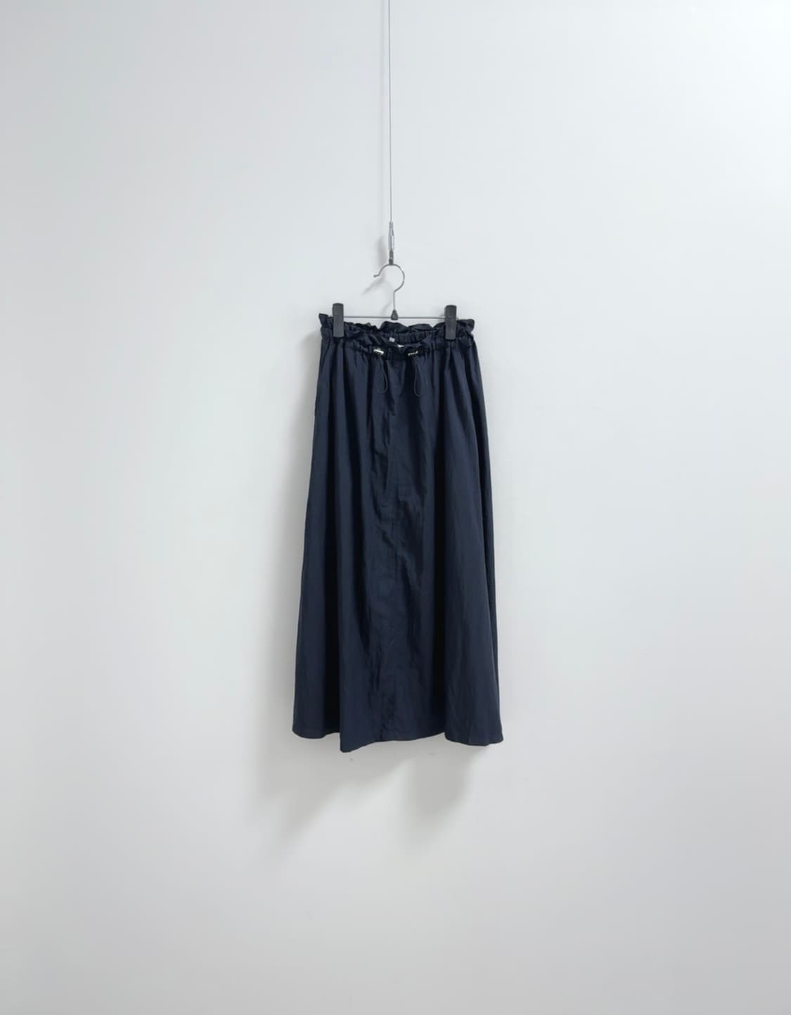 컴젠 네이비 스트링 스커트 상품이미지1