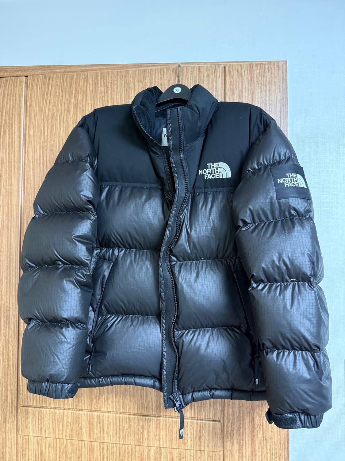 노스페이스 눕시 노벨티 유광 블랙 L 상품이미지1