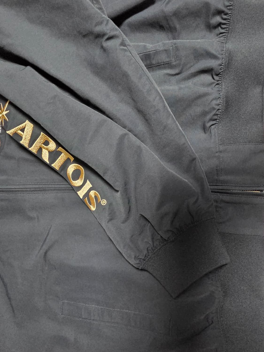 [L] 팔라스 x 스텔라 아르투아 매치 자켓 블랙 상품이미지8