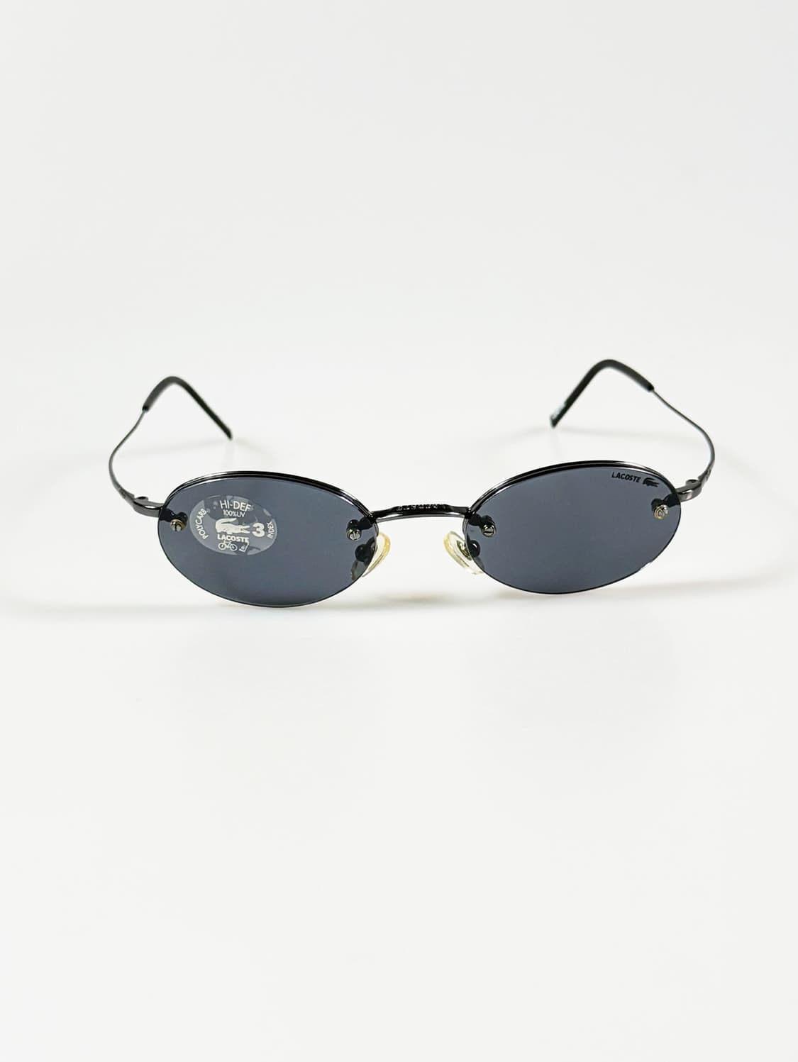LACOSTE 무테 오벌 메탈 프레임 빈티지 선글라스 상품이미지1