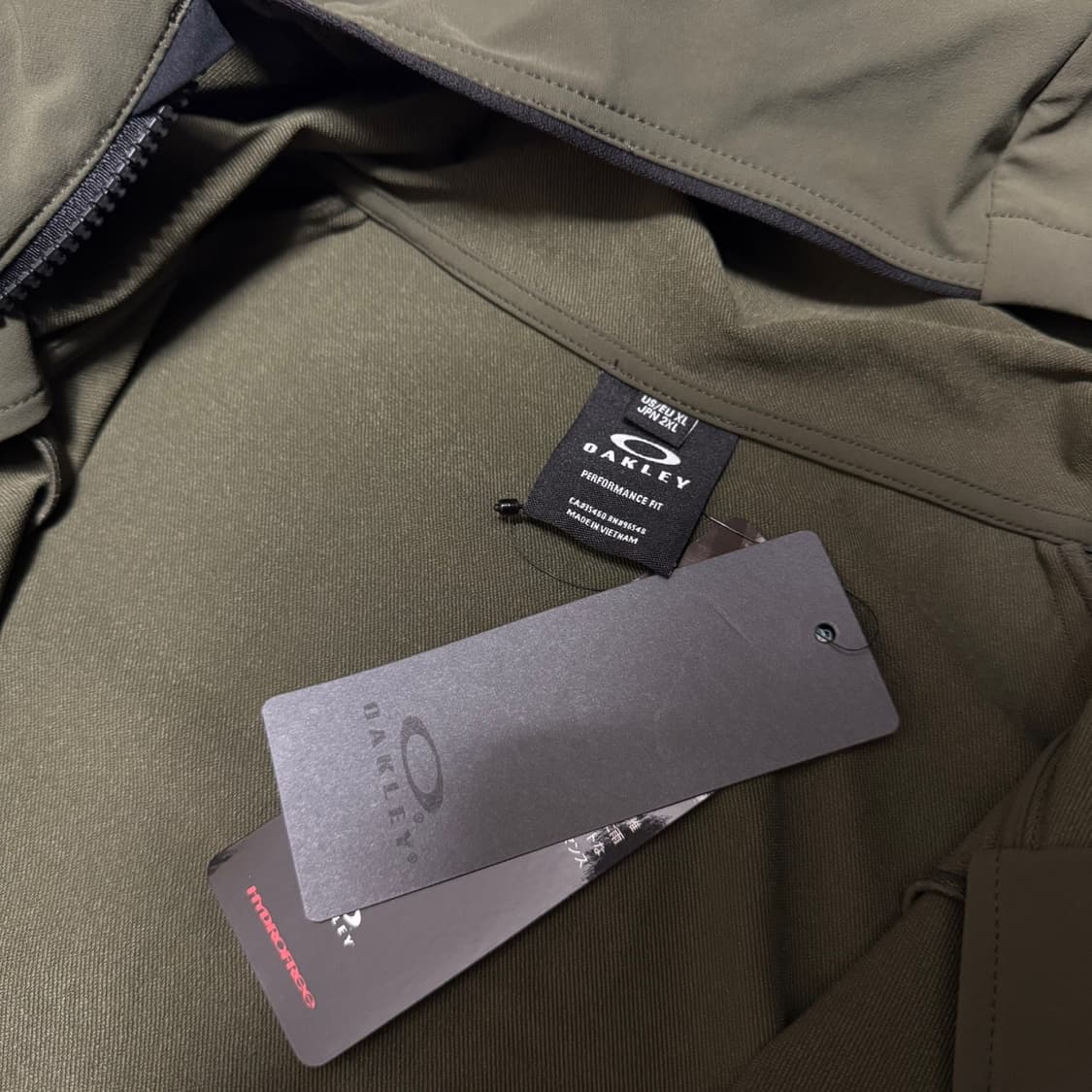 오클리(OAKLEY) 올리브 폴리아미드 엘라스테인 혼방 후드 윈드브레이커 상품이미지3