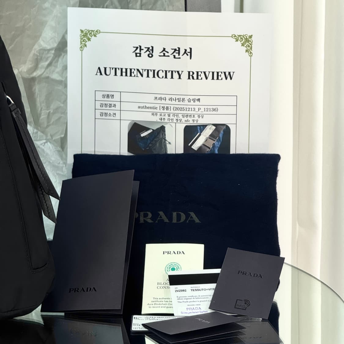 [정품] 프라다 삼각로고 리나일론 레더 슬링백 2VZ092 상품이미지2