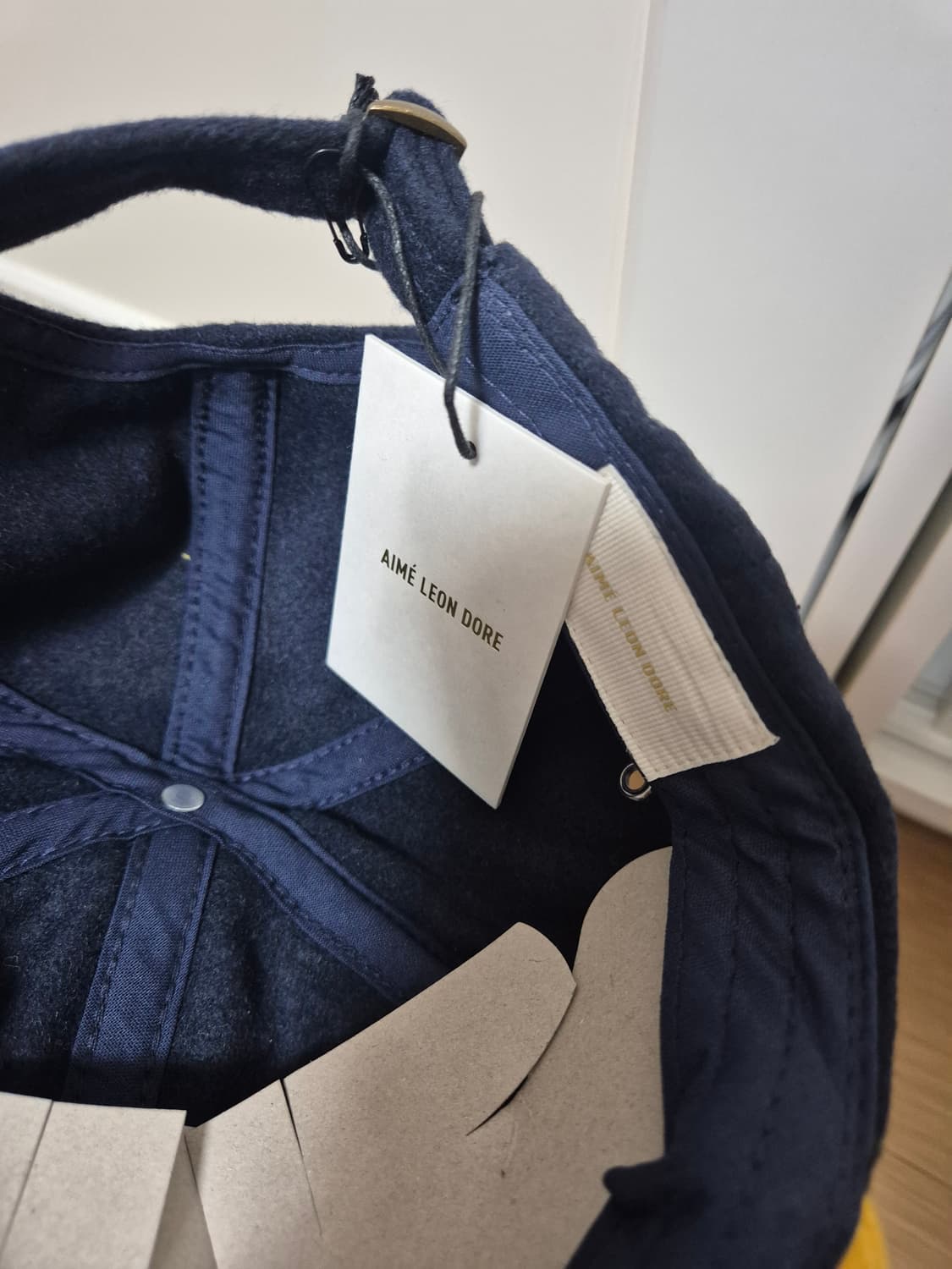 에임레온도르 울 컬러블럭 자수 캡 상품이미지3