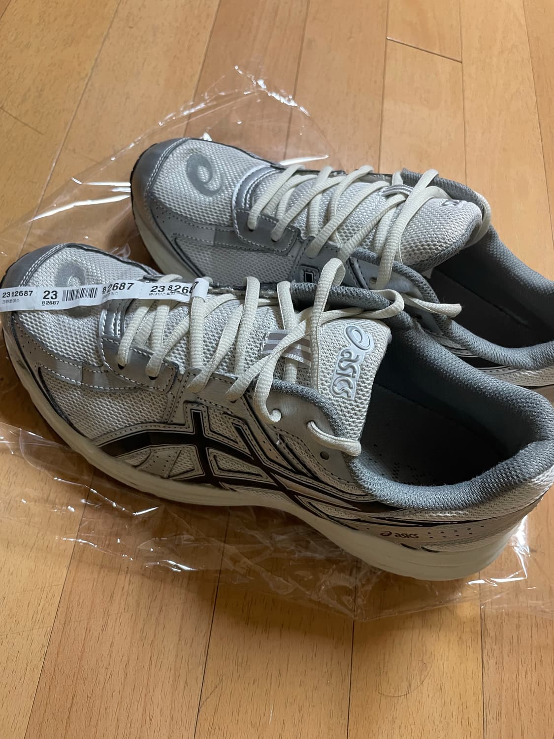 아식스 조그 100s 270 은색 상품이미지1