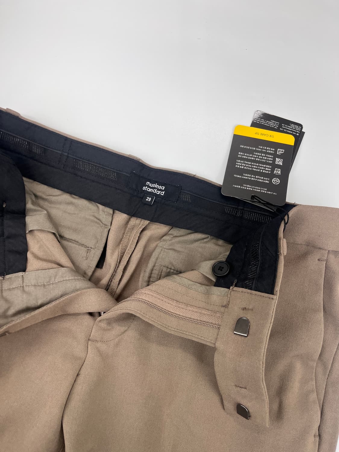 무탠다드 테이퍼드 히든 밴딩 크롭 슬렉스 더스티 베이지 상품이미지2