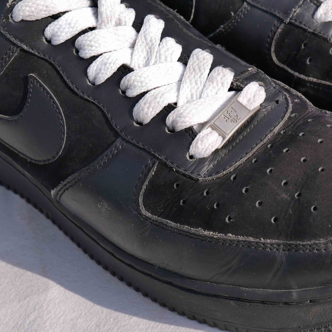 나이키 에어포스 1 로우 블랙 레더 상품이미지4