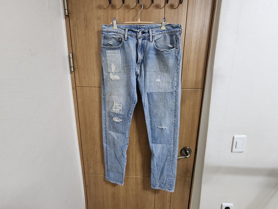 (34)리바이스 512 슬림 테이퍼드 빈티지 데미지 워싱 데님 팬츠 상품이미지1