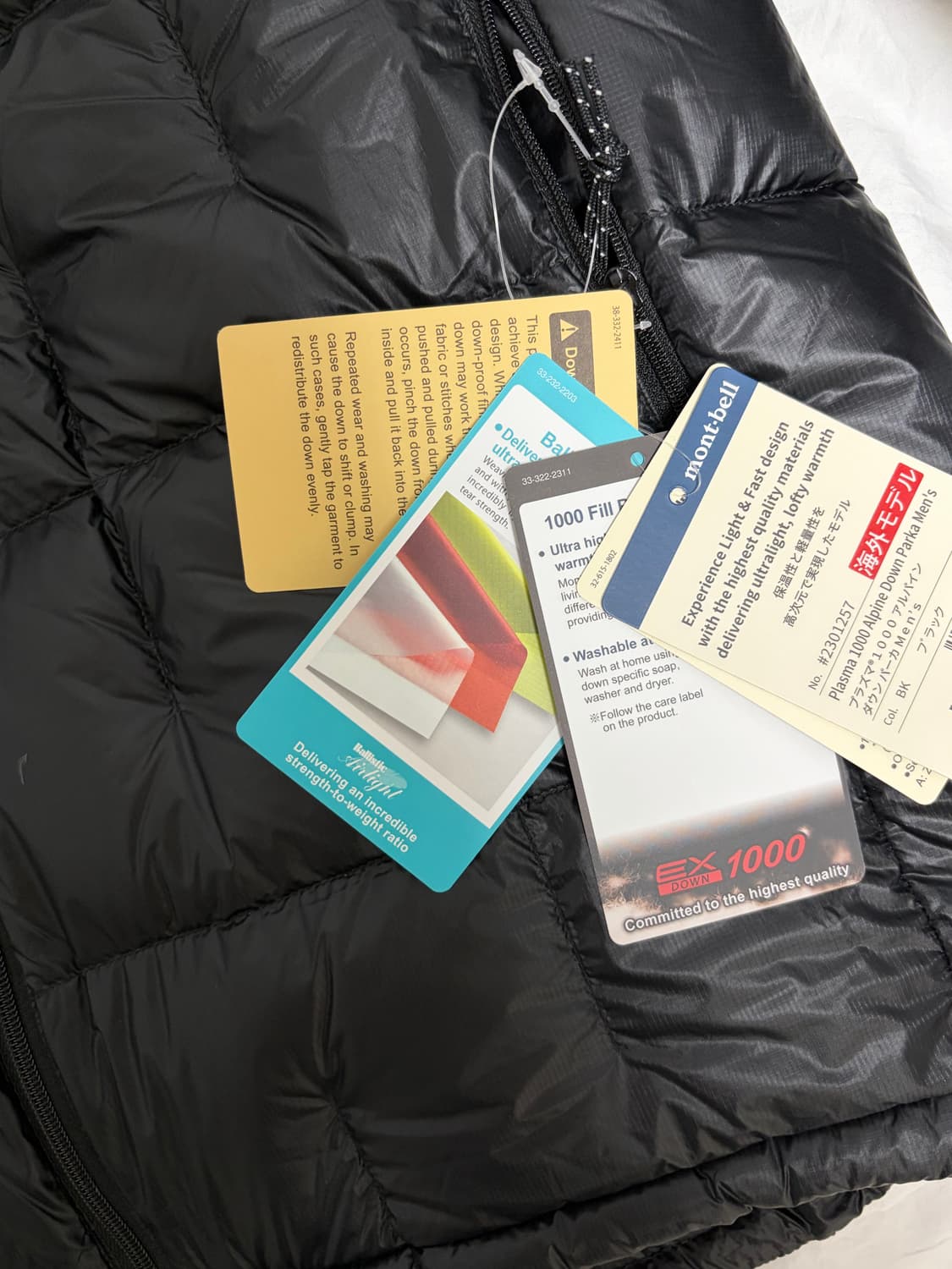 몽벨 플라즈마 1000 알파인 다운 블랙 L 새상품 판매합니다 상품이미지3