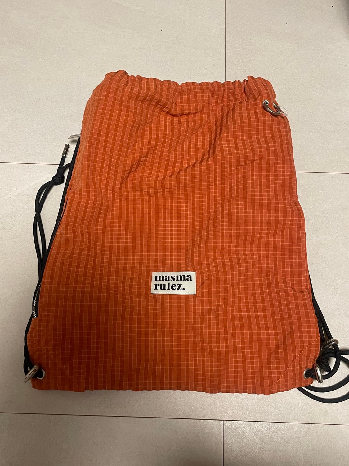 마스마룰즈 오렌지 체크 스트링 백팩 상품이미지1