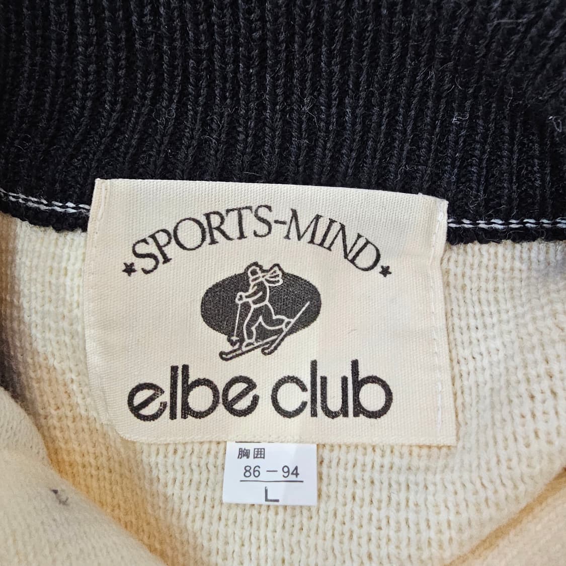 울혼방 스키 로고 버튼 하프넥 아이보리 니트 상품이미지9