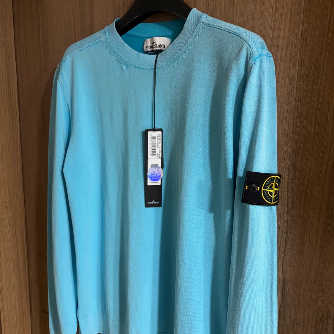 새상품(M)스톤아일랜드 와펜 로고 스웨트 니트 스카이블루 상품이미지1