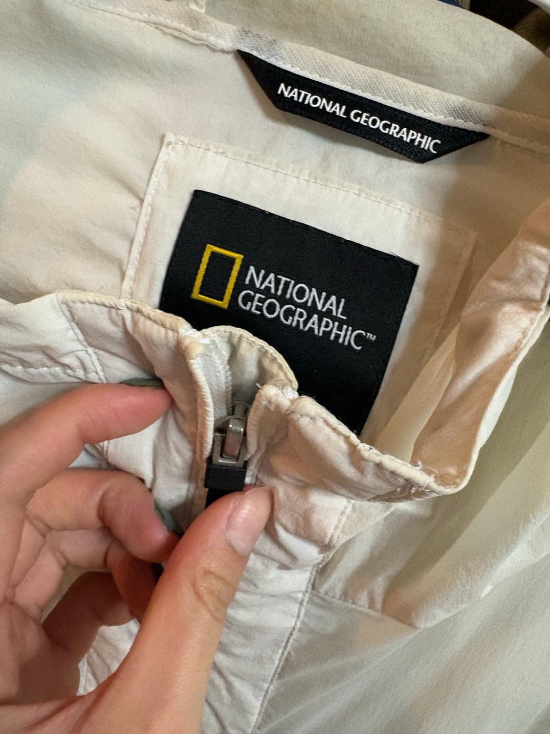 내셔널지오그래픽 아이보리 바람막이 M 상품이미지4