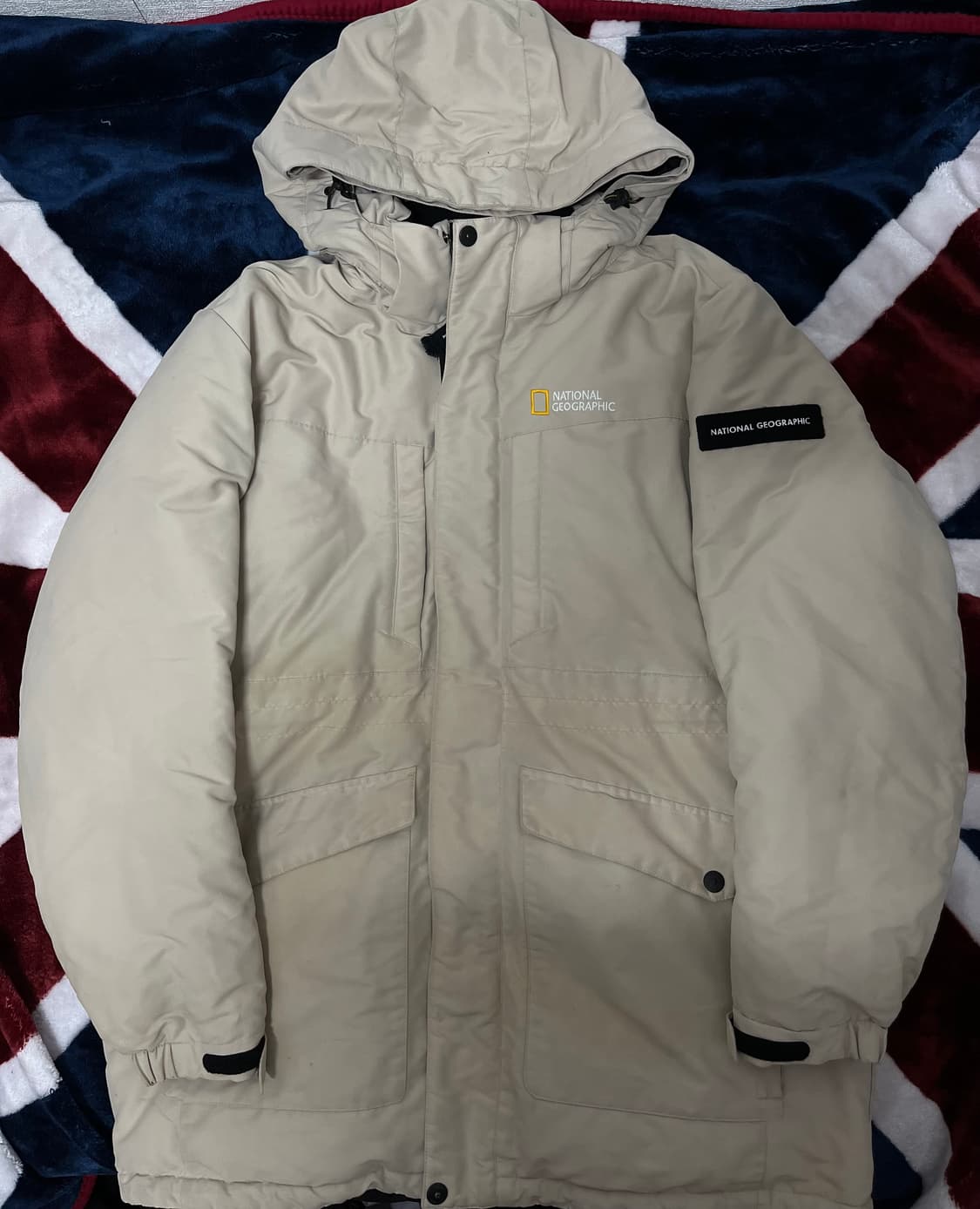 내셔널지오그래픽 베이지 패딩 110 상품이미지1