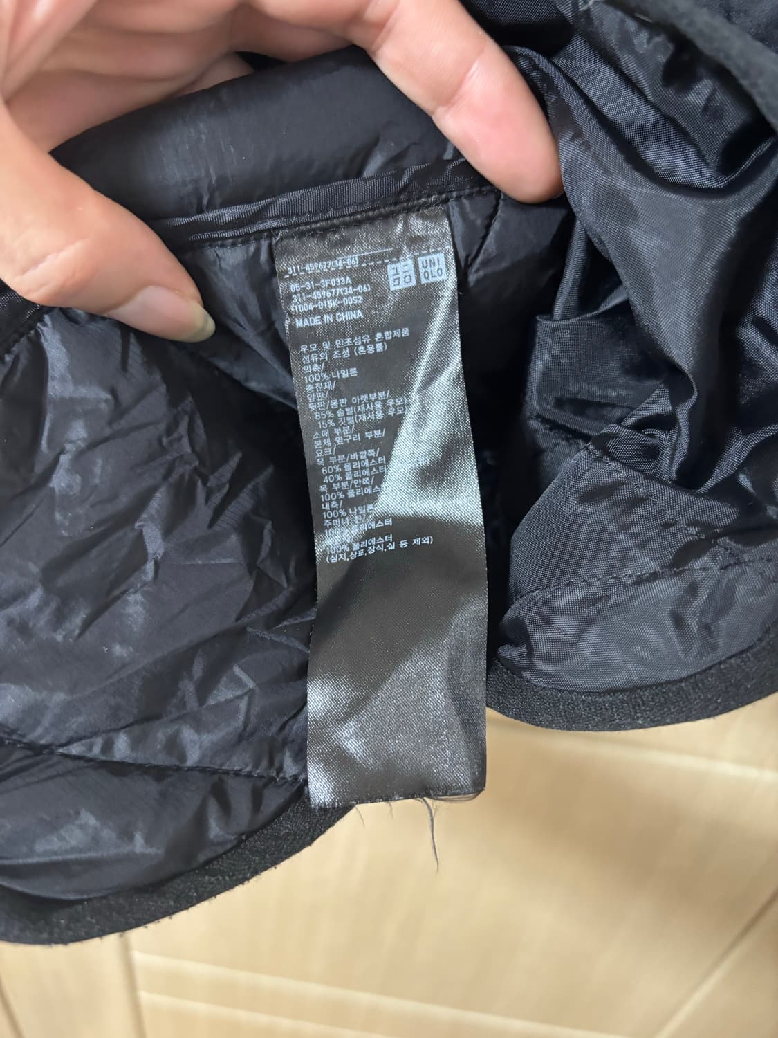 유니클로 화이트마운티어링 경량패딘 상품이미지7