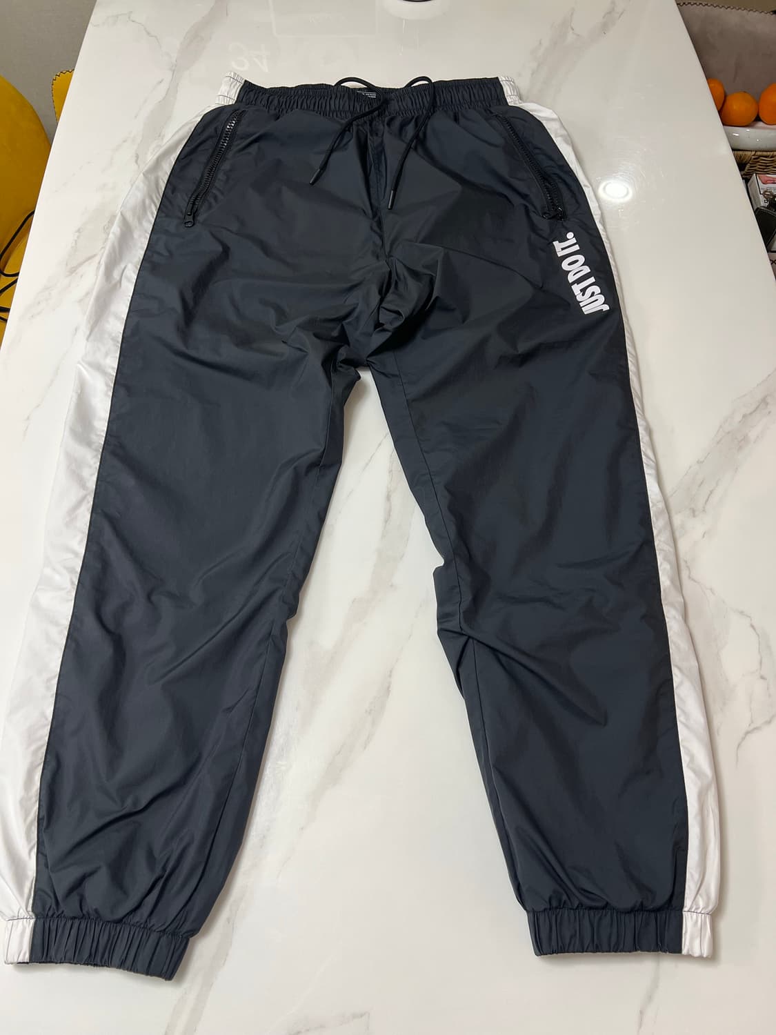 [M] 나이키 NSW 저스트 두 잇 시즌 우븐 팬츠 상품이미지1